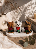 Chiots en jesmonite tenant des roses, faits à la main